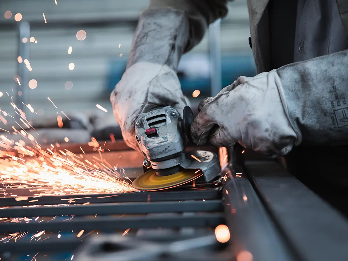 Machining precision components for a commercial dumbwaiter at the factory to ensure smooth and reliable operation