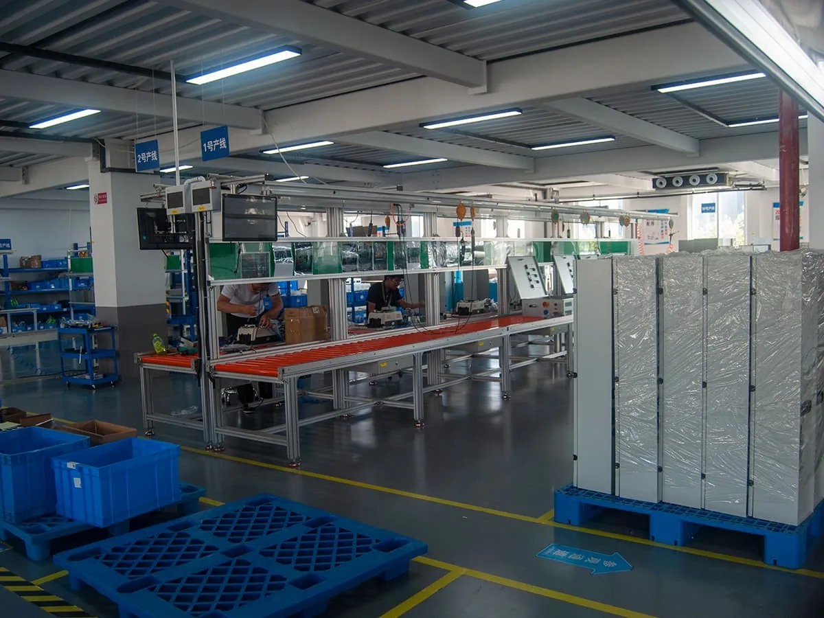 Bar dumbwaiter electrical cabinet being assembled on a factory production line